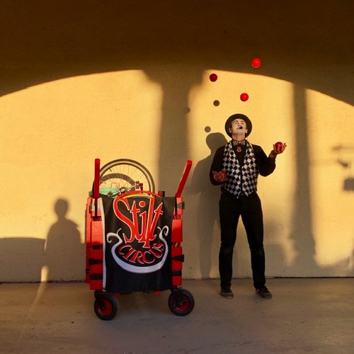 Alex Juggles with
Interactive Circus Cart